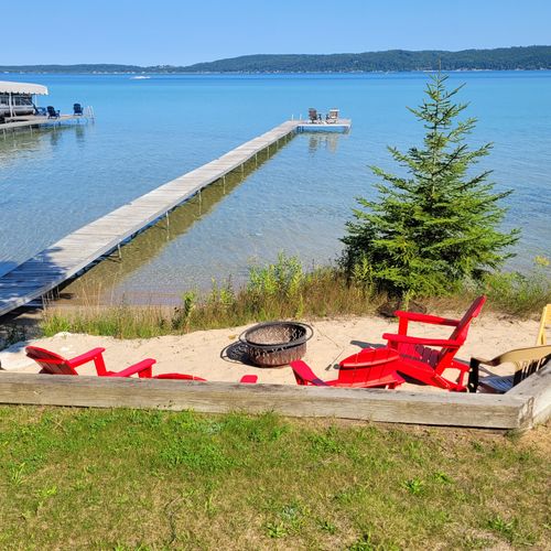 EXTERIOR:  The beach area, bonfire ring, and private dock