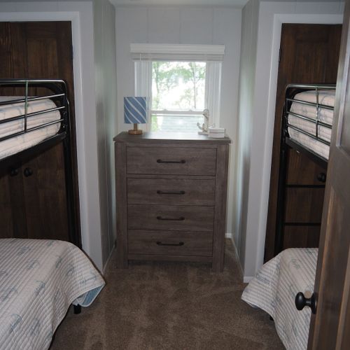 Bedroom #5 (second floor):  has two twin-on-twin bunk beds, thus sleeping four people.
