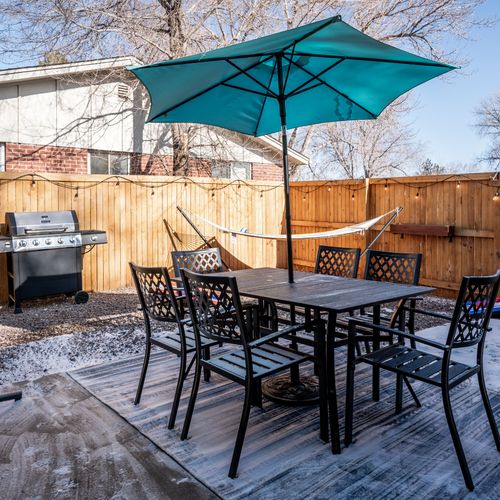 Experience the convenience of a fenced-in front and backyard for your privacy and enjoyment. Please note the patio furniture may be put into storage during the winter months.