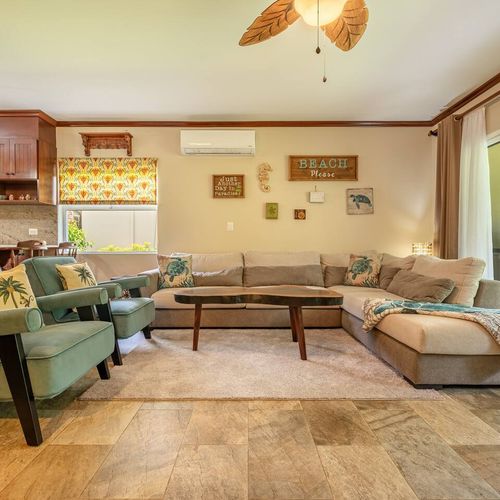Cool up  inside and meet with your family and friends in this cozy living space. It has plenty of room to sit in comfortable couch and chairs.