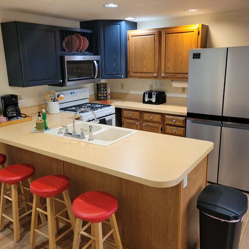 KITCHEN:  The home has a large and modern kitchen with all appliances (including a dishwasher) and a good supply of cooking and dining utensils.