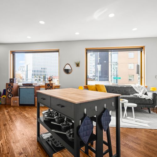 A mix of wood, steel, and light for an inviting city vibe.