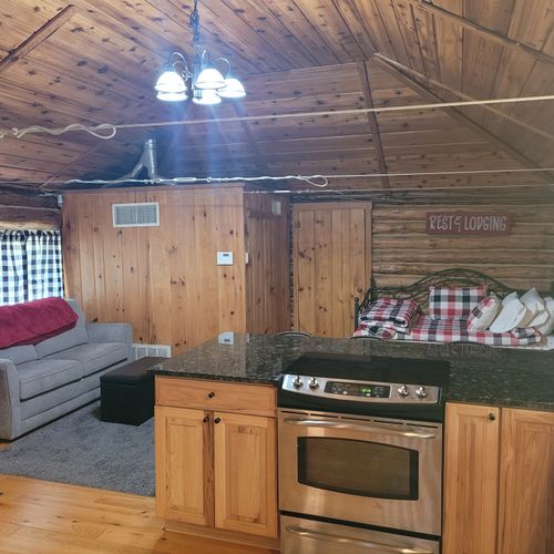 Interior:  another photo of most of the cabin. (note that the trundle bed will be getting replaced with a queen-size bed. )