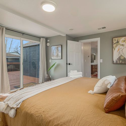 Live in luxe and comfort with the warm yet trendy master suite.