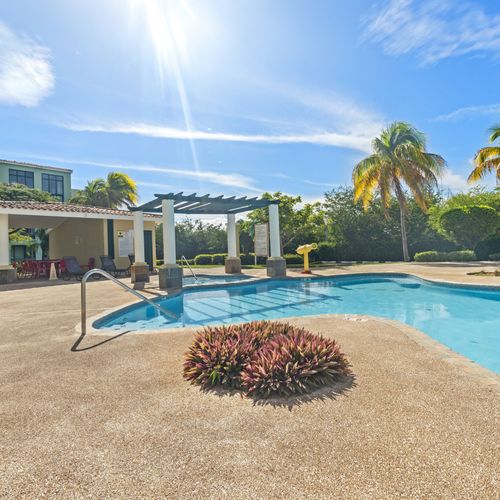 Lounge in the sun by our beautiful, clean pool in a stunning setting.