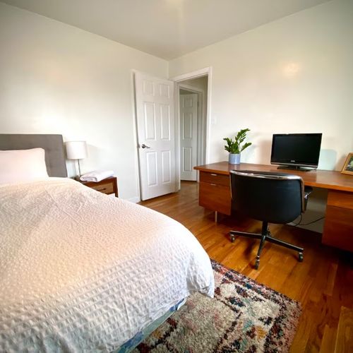 Family &Amp; Dog-Friendly Retreat With Fire Pit 111 Sleek desk for catching up in comfort in this cozy, light-filled bedroom.