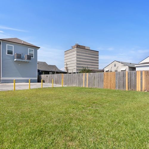 Open grassy field right by the property — great for games or just stretching out.