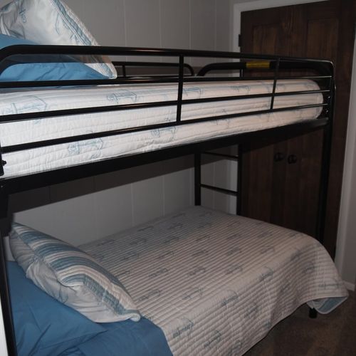 Bedroom #5 (second floor):  has two twin-on-twin bunk beds, thus sleeping four people.
