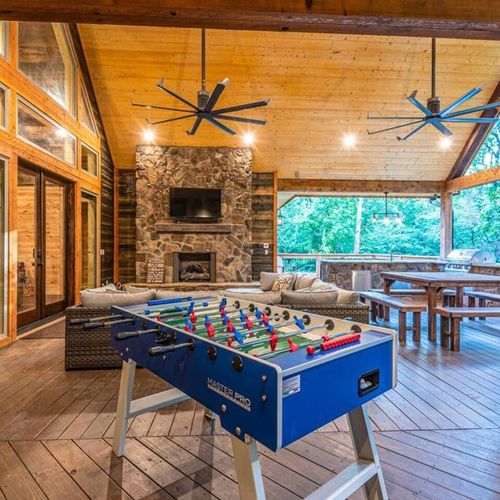 A foosball table on the patio.