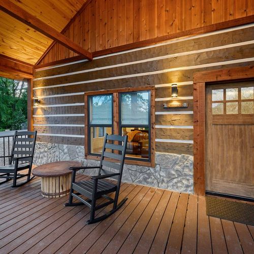 The front porch welcomes you with rocking chairs!