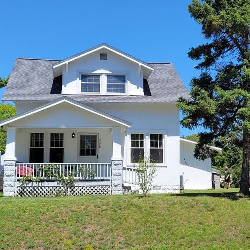 Overall:  the front of the house including the charming front porch.