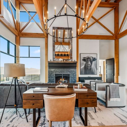Living space adorned with tasteful furnishings and spectacular mountain backdrop.