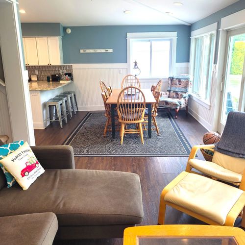 Larger house - living room:  looking out from the living room towards the dining area.