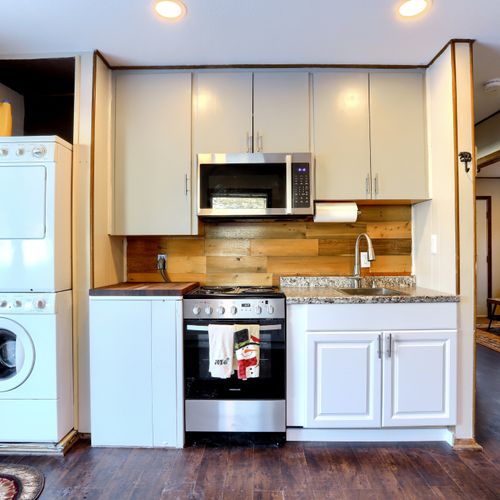 Enjoy modern appliances in this quaint space.