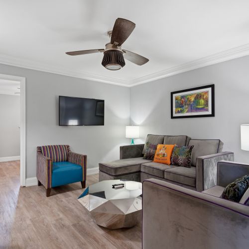 Relaxed living area w/ Smart TV & warm accent pillows