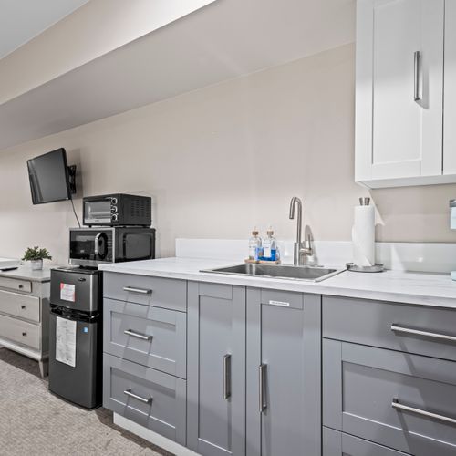 Functional kitchenette corner ready for your morning coffee or evening bite.
