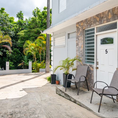 Quaint patio perfect for morning coffee.