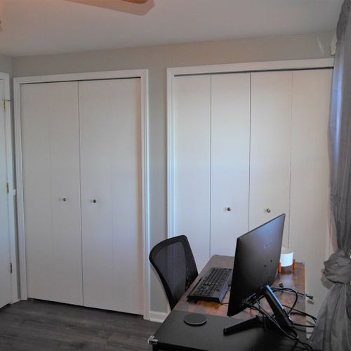 Bedroom #2 (main floor):  includes a futon, workstation (desk, chair, and monitor), ceiling fan, closet, and another lovely lake view!