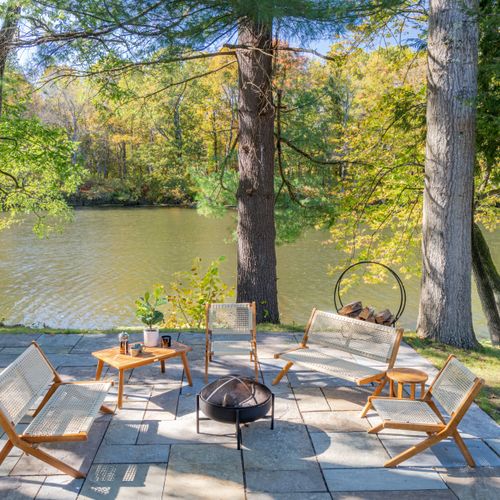 Patio and views of the river and firepit.