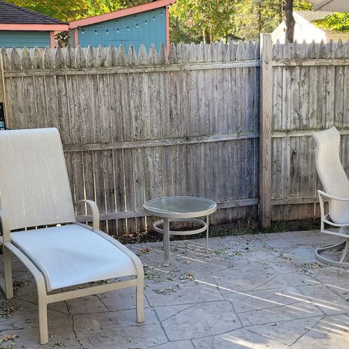 Exterior:  lounge chair and table.