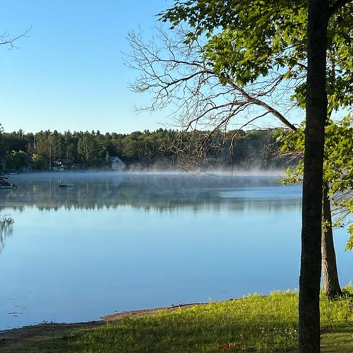 Exterior:  the lake with a little fog on top.