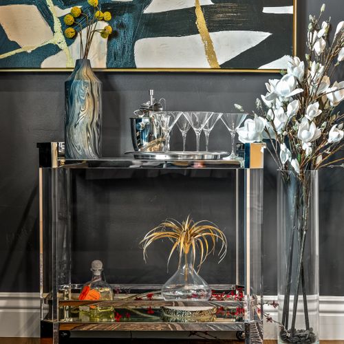 The bar area is fully equipped for mixing your favorite cocktails.