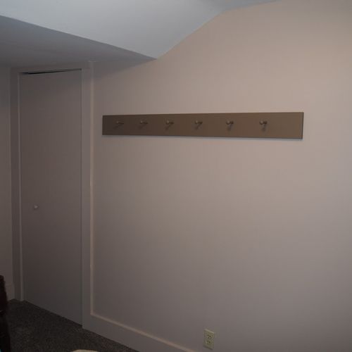 Bedroom #2:  features 2 twin beds, window a/c unit, nightstand, lamp, and mirror.