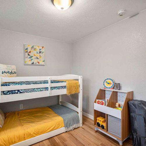 Kids toys, books, and a pack-n-play ready for the little ones