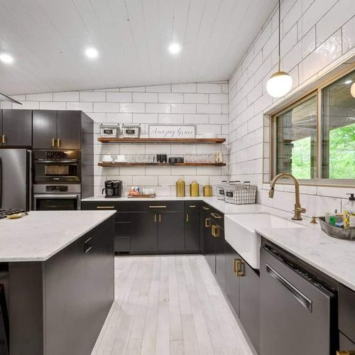 The white, black and gold decor is the epitome of modern luxury.
