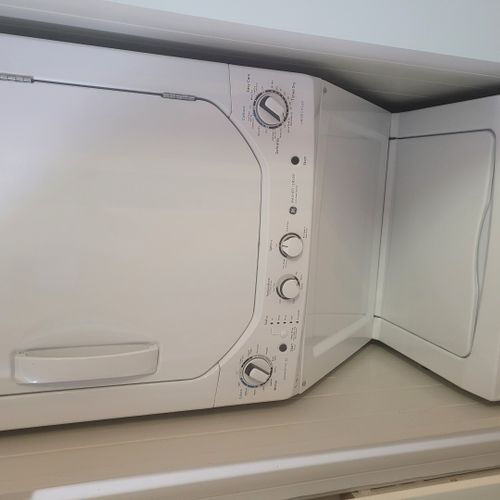 Laundry closet:  the home has a very convenient laundry closet with a stacked washer and dryer. It's conveniently located near the kitchen.