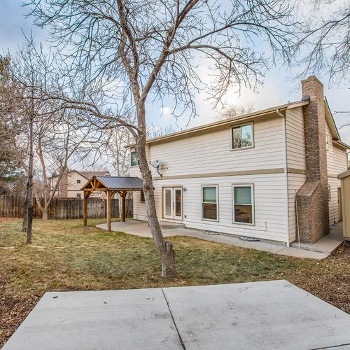 The spacious back yard of this home is the perfect place to relax and enjoy the great outdoors.