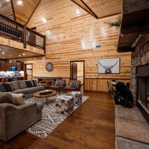 From the living room you can easily socialize with those in the kitchen.