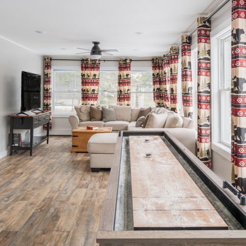 Play a game of shuffleboard in our foyer