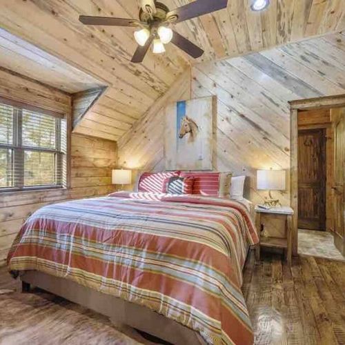 Upstairs Master 6 with outdoor views and an attached private bathroom.