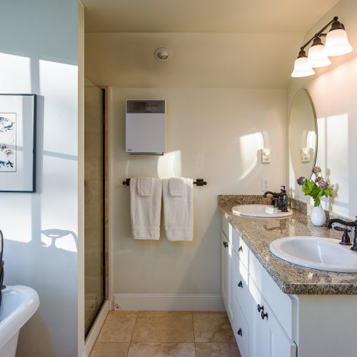 A clean, comfortable bathroom stocked with essentials for a relaxing stay.