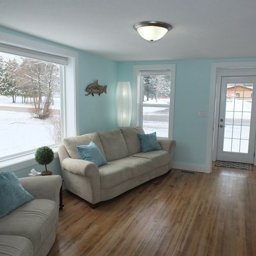 Downstairs living room:  another view of the downstairs living room highlighting all of the beautiful natural lighting!