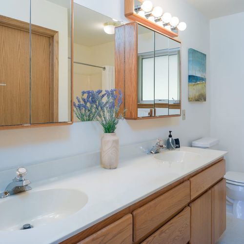 Master Bathroom with double vanity and quality towels.