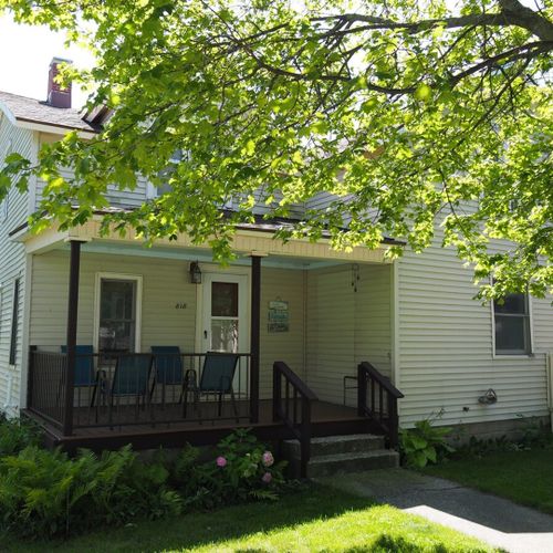 Overall:  the front of the house, highlighting the private front porch.