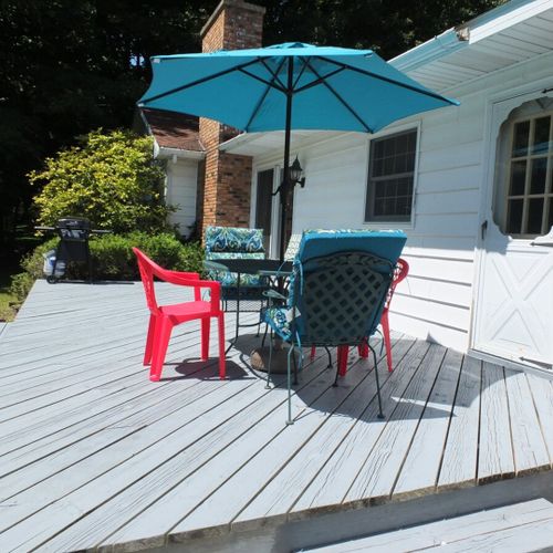 Exterior:  the backyard deck and outdoor dining furniture