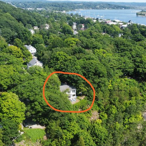 Exterior:  another aerial view highlighting the home's proximity to downtown frankfort and betsie bay