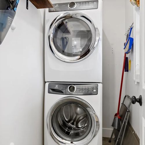 LAUNDRY ROOM (MAIN FLOOR):  The home has an extremely convenient main floor laundry room.  (Note that there is also a washer and dryer on the lower level as well.)