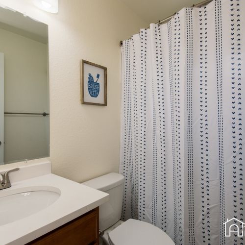 There is a hall bath conveniently located between the bedrooms, great for groups and families.