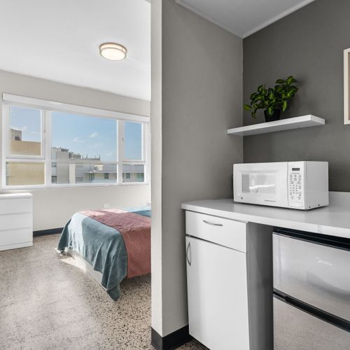 Enjoy the convenience of your personal kitchenette, complete with a mini-fridge and microwave – perfect for quick snacks, beverages, and simple meals during your stay.
