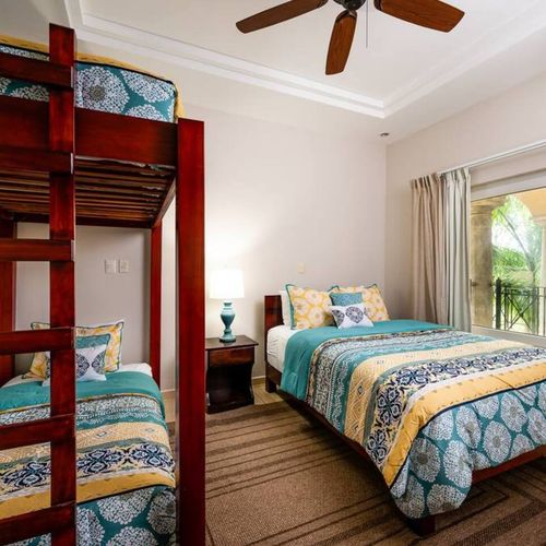 Guest  BDR  with  a twin  bed and a twin bunkbeds sleeping 3 guests total