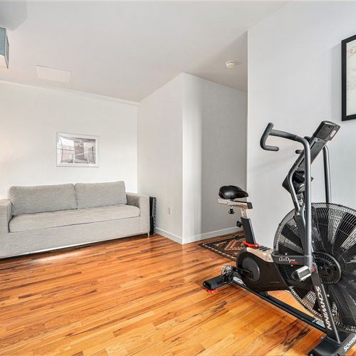 Loosen up in a multi-purpose area with a pull-out sofa bed for extra guests and a compact workout area with a stationary bike and free weights. Perfect for recharging or breaking a sweat.