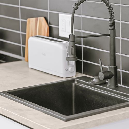 Cook your favorite meals with ease—kitchen includes toaster, coffee maker, pots, pans, and more.