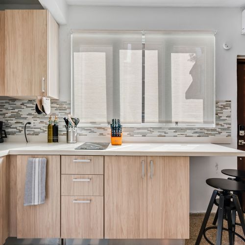 Home Away From Home: Enjoy the convenience of a well-appointed kitchen, complete with essential appliances and a welcoming, open layout that makes cooking and entertaining a breeze.