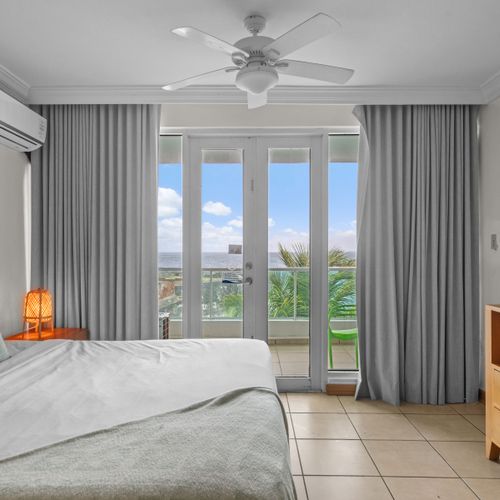 Your tranquil oasis awaits. This spacious studio bedroom connects to a private balcony.