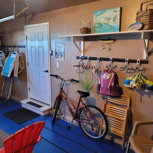 GARAGE (FIRST FLOOR):  The garage is not available for cars, but there is a good supply of outdoor gear that is available for guest usage.  Note that the canoe that is hanging on the wall is not available for guest usage.  It is for decoration only.