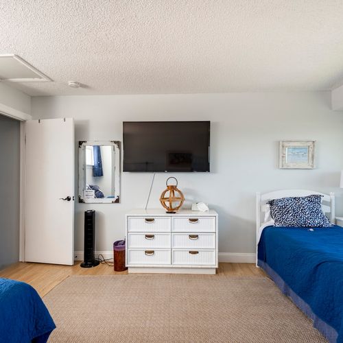 Watch your favorite shows and movies–each bedroom is equipped with a widescreen tv.